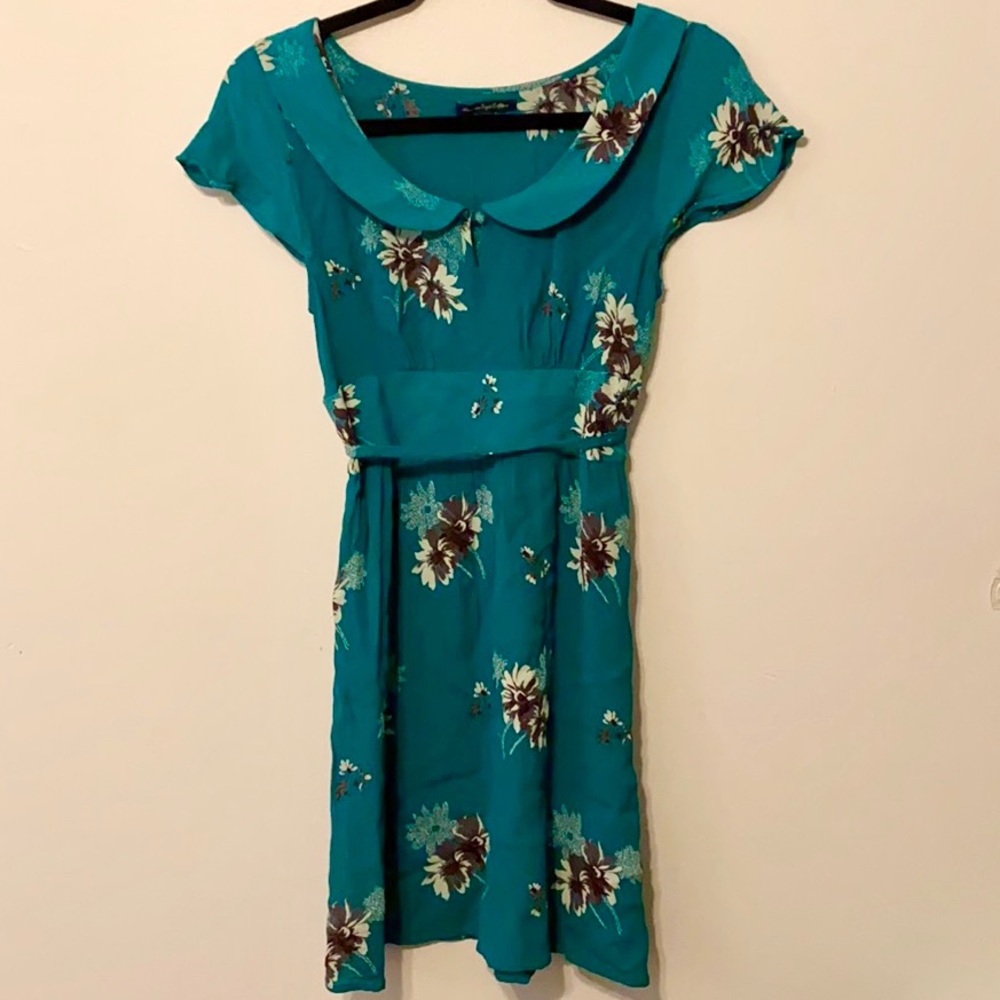 Turquoise dress with black and white floral print